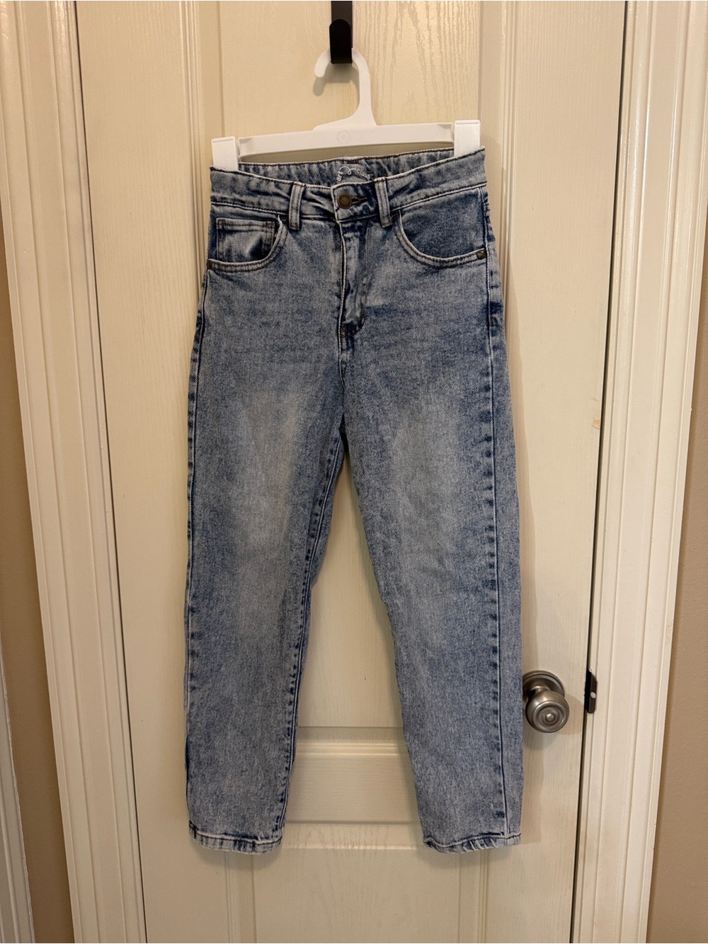 Art Class girls’ Girlfriend jeans, size 12, in a light washed blue denim.